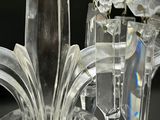 a crystal chandelier that is hanging from the ceiling