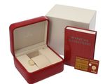 a red box with a gold ring inside of it