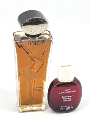 PARFUMS. Réunion de deux flacons : -Guy Laroche, Clandestine…