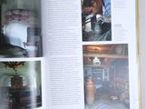an open book with pictures of a man working on a stove