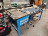 an image of a workbench in a garage with tools