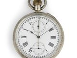 a silver pocket watch with roman numerals on the face