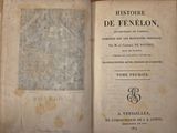 an old book that is open on a table