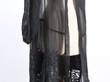 an image of a mannequin wearing a black coat and black pants