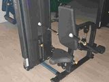 an image of a gym room with equipment in it