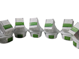 several packages of food are lined up in a row on a white surface