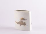 a white vase with a gold leaf design on it
