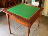 a small table with a green mat on top of it