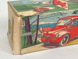 a box with a picture of a red car on it