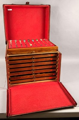 a wooden box with a red cover on top of it
