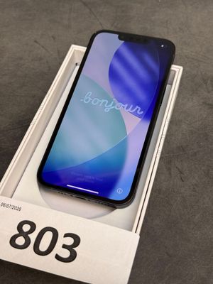 an image of a box with a phone in it sitting on a table