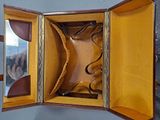 an open suitcase with a pair of glasses inside of it