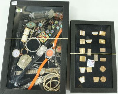 a black box with a bunch of jewelry inside of it