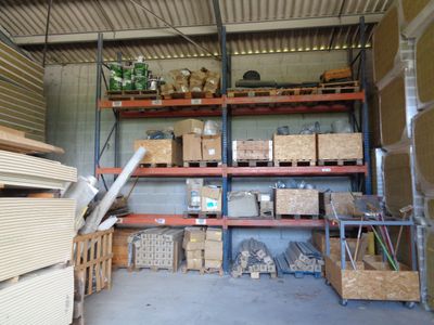 a room filled with lots of boxes and boxes of wood