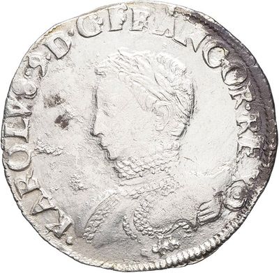 a close up of a coin on a white background