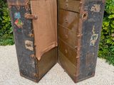two open suitcases that are sitting on the ground