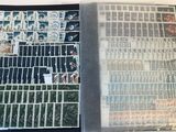 an open book with a bunch of stamps inside of it