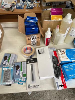 a table with a lot of office supplies on it