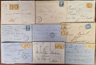 several old envelopes are stacked on top of each other on a table