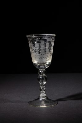 a glass that is sitting on a table