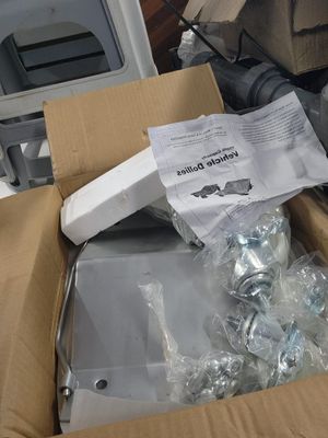 a box full of assorted items sitting on the floor