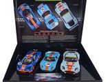 a close up of a display case with four toy cars in it