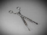 a pair of scissors that are sitting on a table