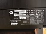 the back of a printer that is sitting on top of a table