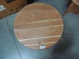 a wooden table that has a label on it