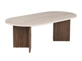 La table ovale est en bois et possède un plateau en marbre blanc.