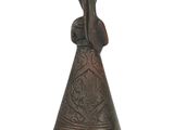 an image of a bronze bell with a woman on it