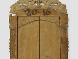 an old wooden door with a sign that says 2016 on it