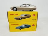 two boxes of toy cars sitting on top of each other on a white surface