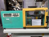 a machine that is sitting on a table in a warehouse