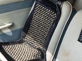an image of a seat in a car with a seat cushion