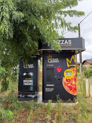a vending machine in the middle of a field
