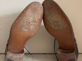 a pair of shoes that are sitting on the floor