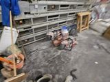 an image of a room that has a bunch of items on the floor