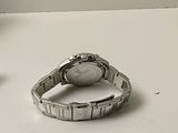a watch that is sitting on a white table