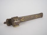 an old brass door handle on a white background