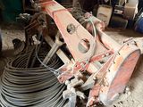 a picture of a machine that is sitting in the dirt