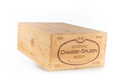une boîte en bois sur laquelle est collée une étiquette portant l'inscription « chasse - spleen »