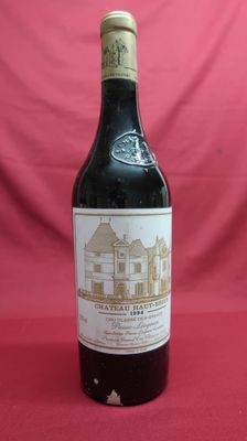 a bottle of wine that is sitting on a table