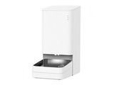 a close up of a white toilet with a water dispenser
