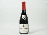 a bottle of wine that is sitting on a table
