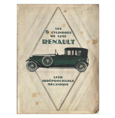 un vieux livre sur lequel figure l'image d'une vieille voiture