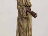 bronze statue of a woman with a turban on her head