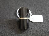 a ring with a tag on it sitting on a table