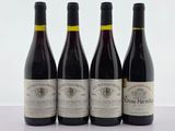trois bouteilles de vin rouge sont alignées sur une table