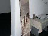a picture of a table with a book and a picture on it